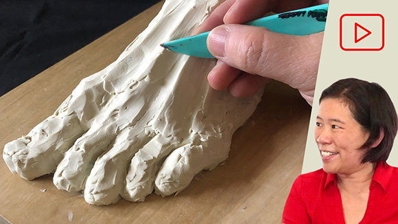 Sculpting a Foot in Clay